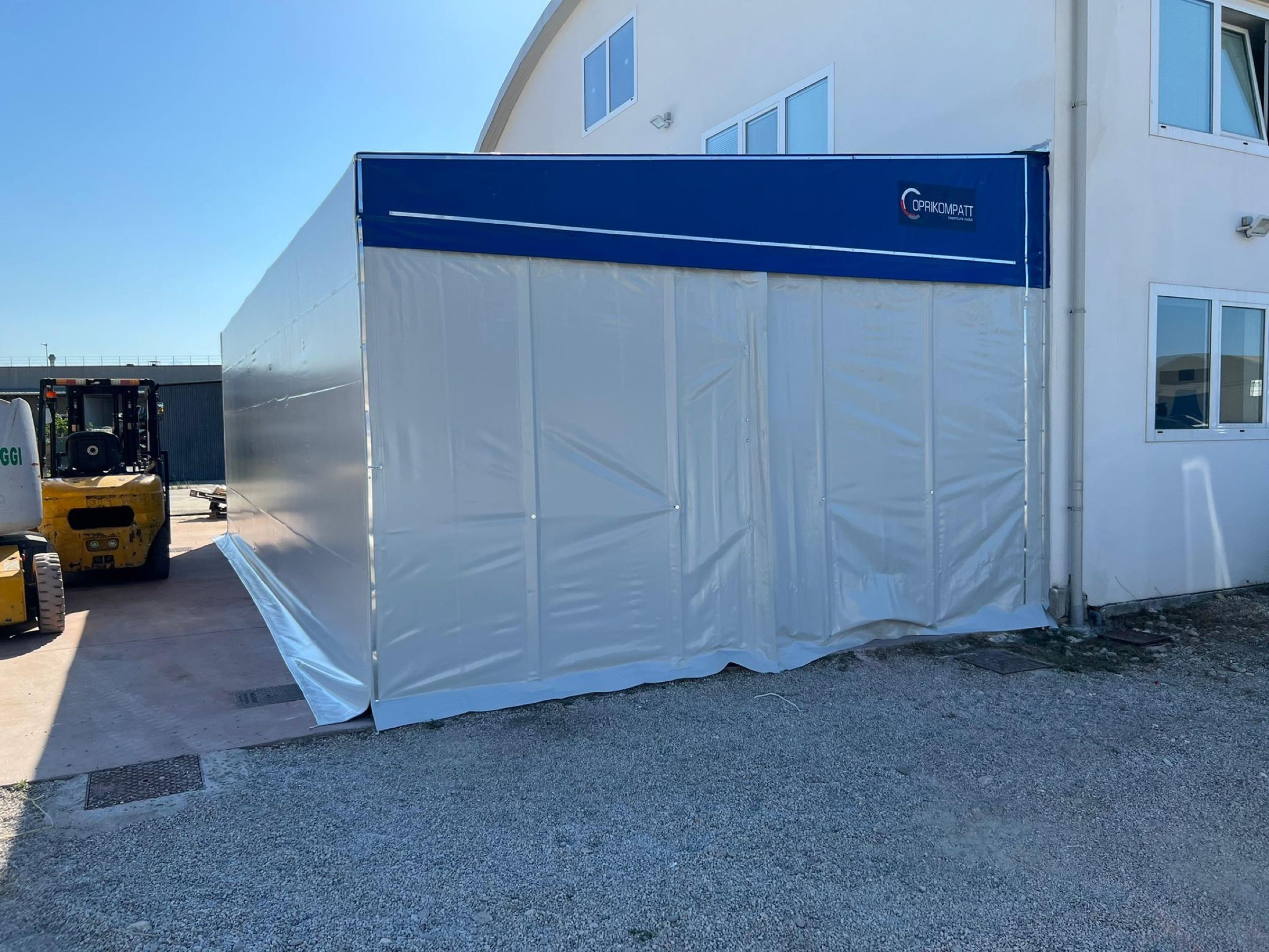 Copritutto CTZ struttura affiancata a edificio